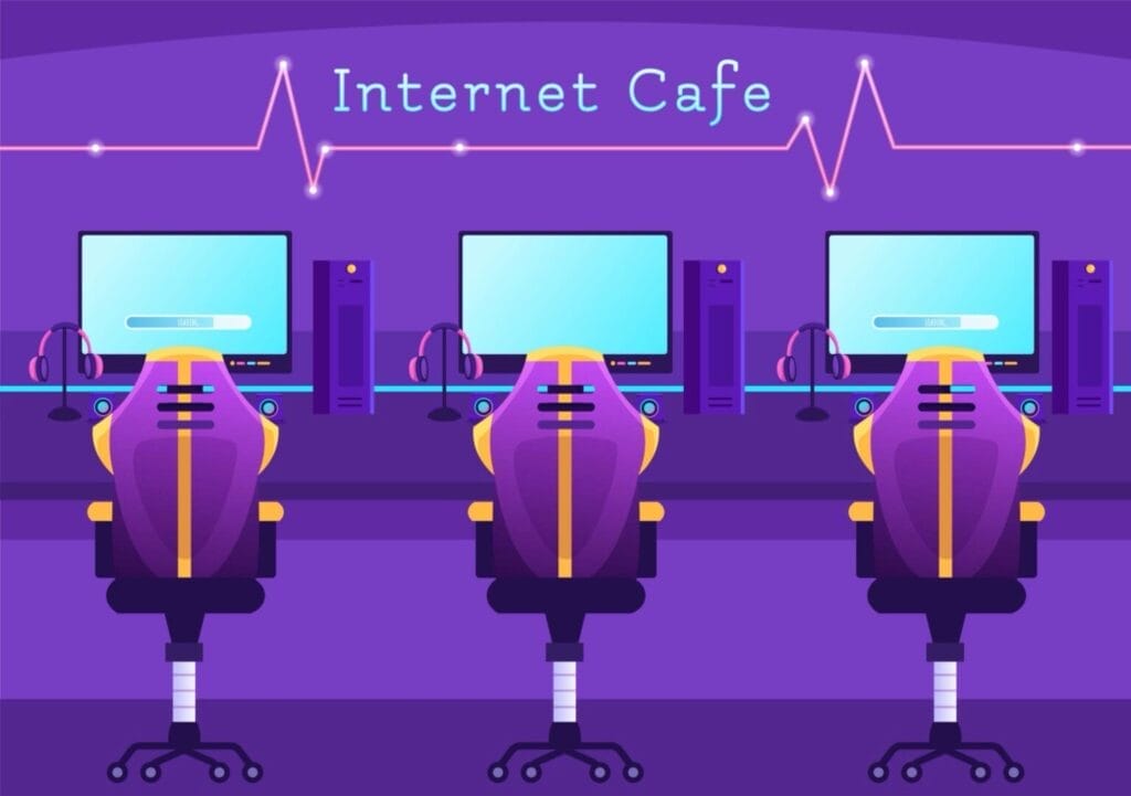 Internet-Café mit Computern und Kopfhörern